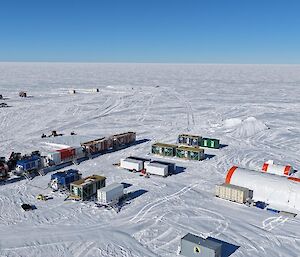 A cluster of shipping containers and Antarctic buildings