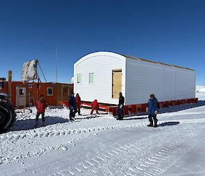 A building on a tray on snow