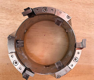A circular cutting blade that sits on the end of an ice core drilling barrel.