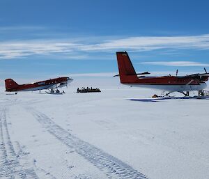 A Basler and a Twin Otter on a snow runway.