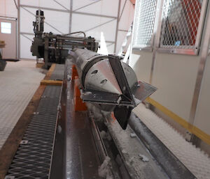 A conical piece of metal with sharp cutting blade inserted at the end of the drill barrel.