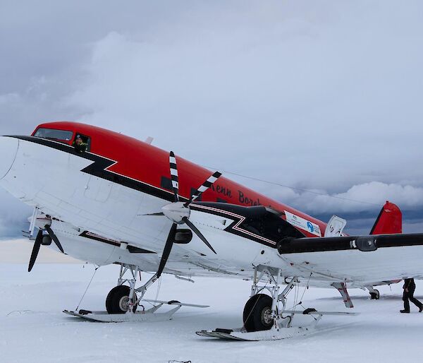 The JKB Basler parked at Casey Ski way, in the background a dark cloud rolling up the ski way hill